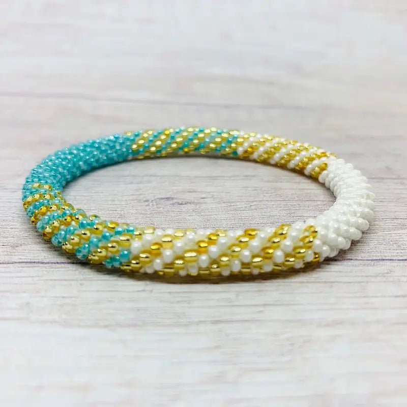 Radiant Sky Nepal Roll On Bracelet Czech Glass Beads Gold Teal radiant-sky-nepal-roll-on-bracelet-czech-glass-beads-gold-teal
